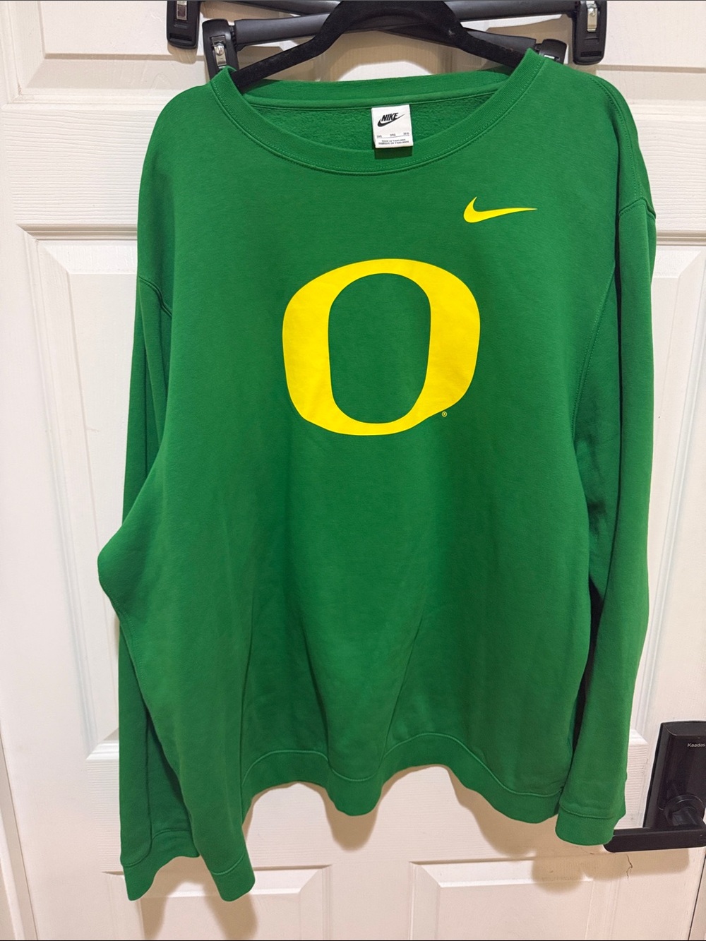 Nike Green Crewneck Sweatshirt with Yellow 'O' and Swoosh